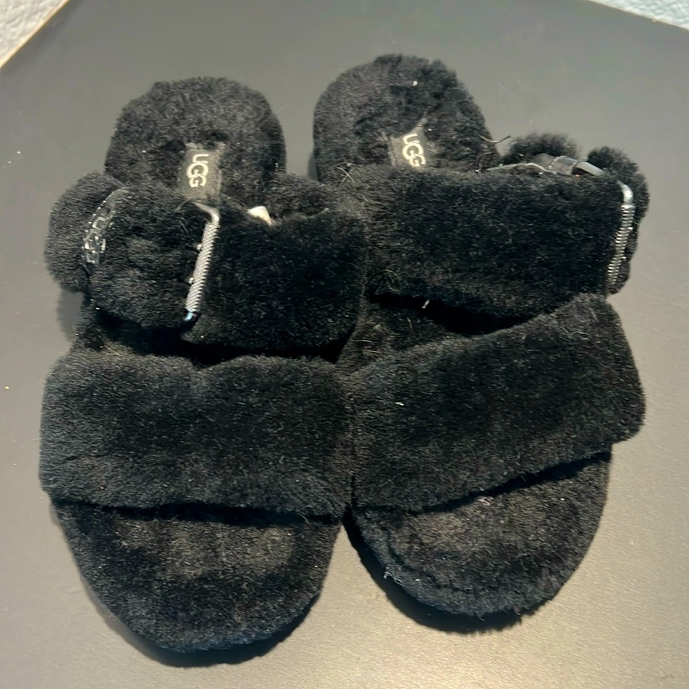 Slightly used slip on UGG slippers!!